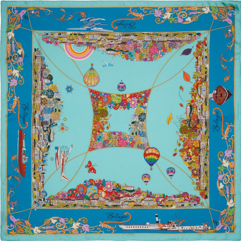 blue silk scarf with four colourful depictions of the town of Bellagio on lake Como during the seasons