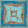 blue silk scarf with four colourful depictions of the town of Bellagio on lake Como during the seasons