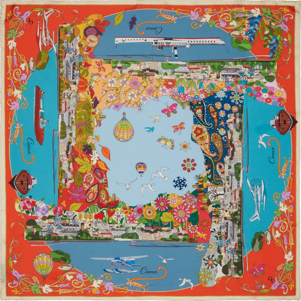 orange and blue silk scarf with colourful depiction of the city of Como during the seasons