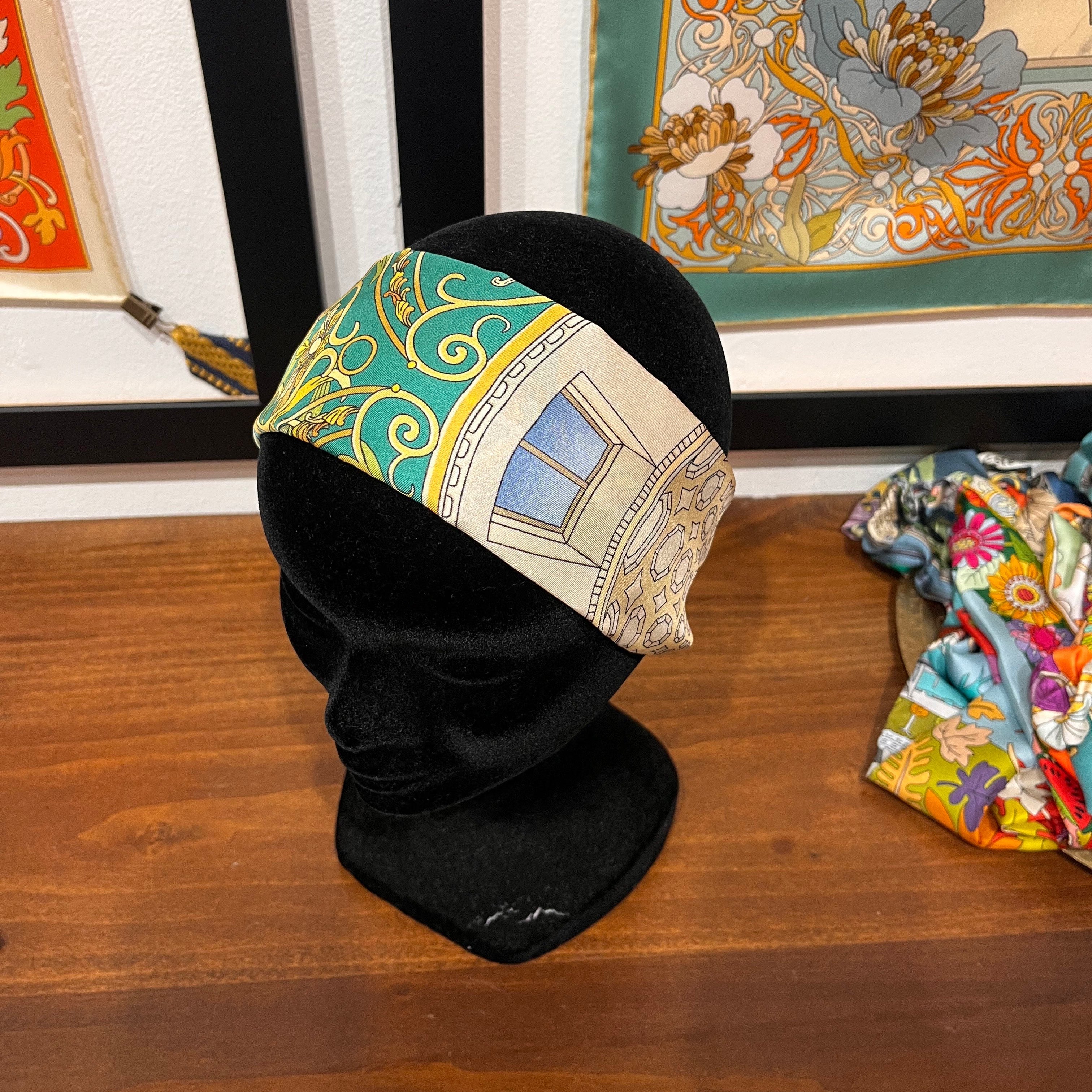 green and white silk headband with architectural design