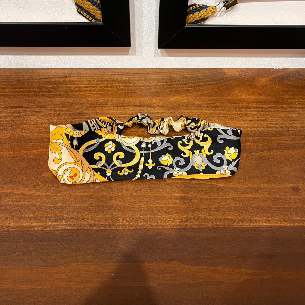 black and gold silk headband with floral design