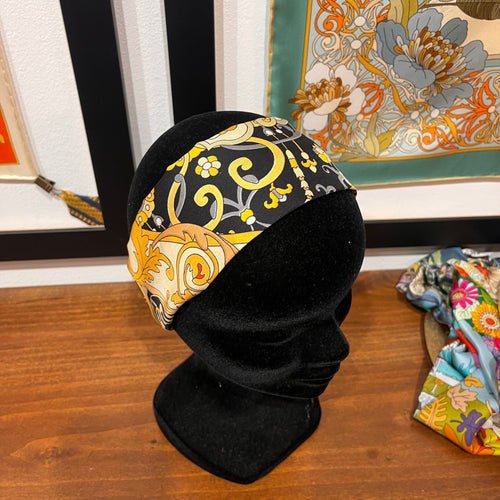 black and gold silk headband with floral design