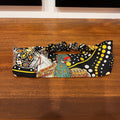 black and gold silk headband depicting the Medici family