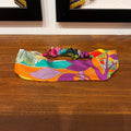 orange and purple headbnd with flowers and lemons design