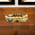 blue and gold silk headband with architectural design