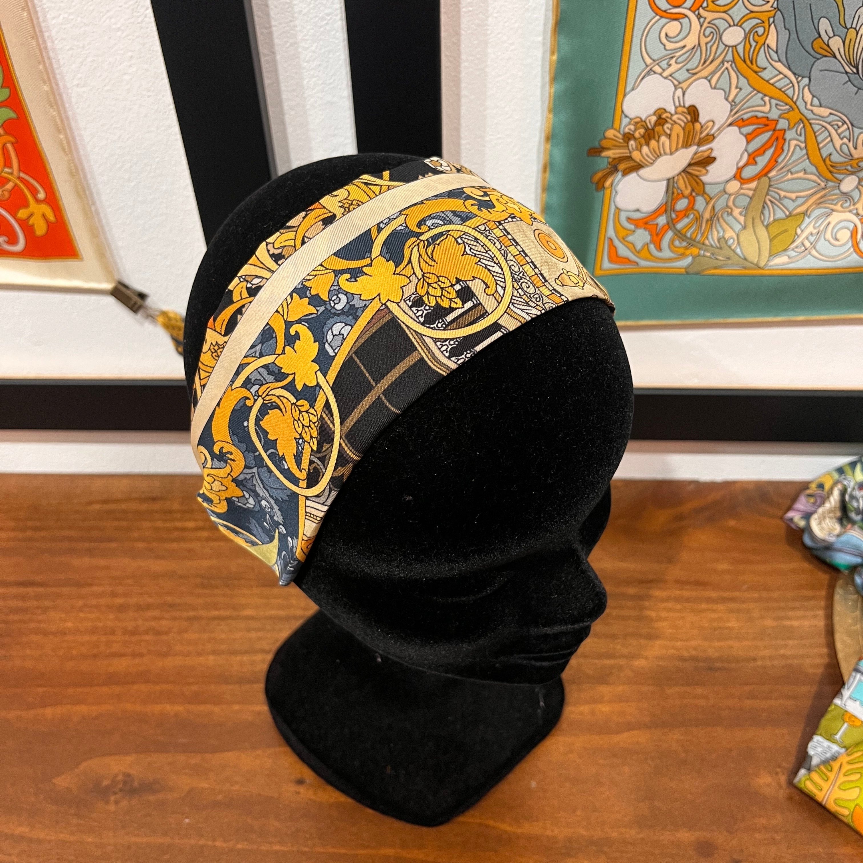 blue and gold silk headband with architectural design