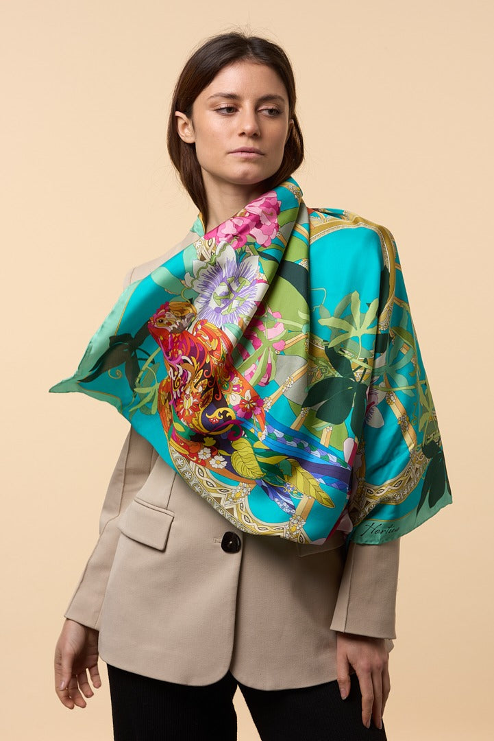 woman wearing cream jacket and colourful silk scarf