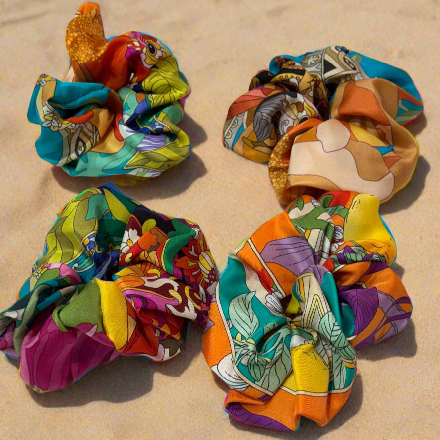 colourful silk scrunchie with yellow lemons, orange, red, blue and violet patterns