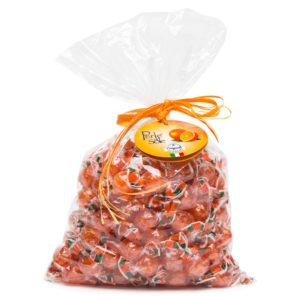 Clear bag of orange candy with a visible brand label on a white background