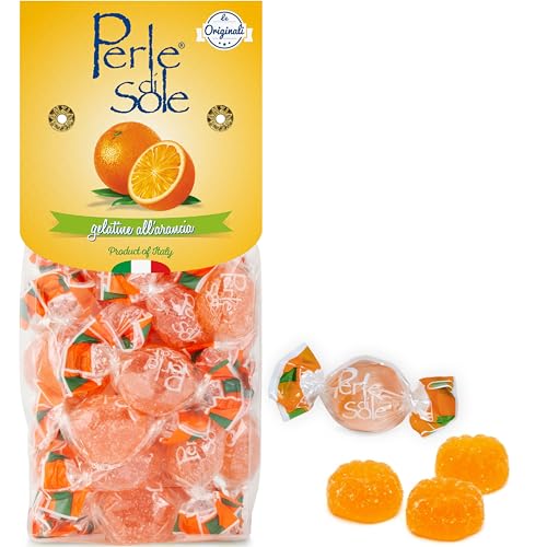 Packaging of Perle di Sole orange gummy candies with a close-up of the candies on a white background.