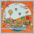 orange silk scarf with colourful decorations depicting the town of Menaggio on Lake Como