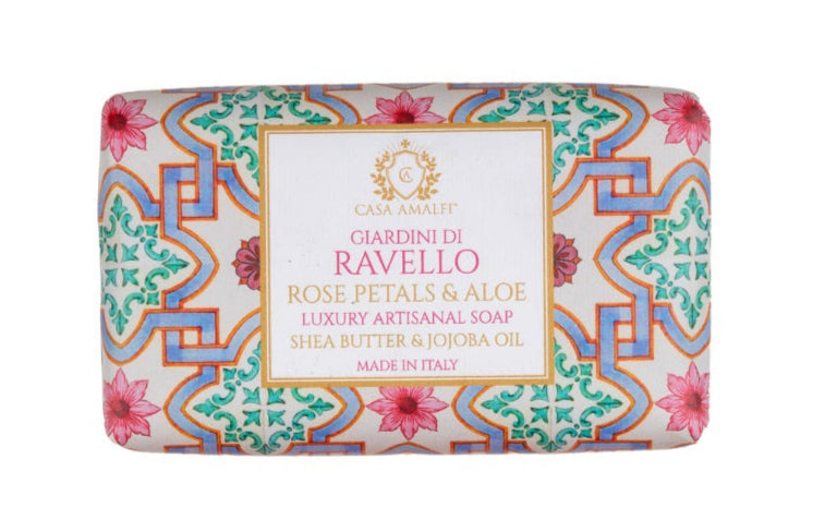 Decorative soap bar with 'Gardini di Ravello' branding on a white background
