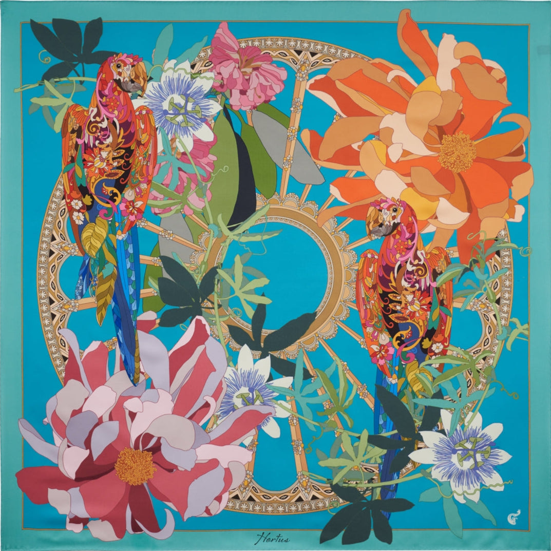 blue silk scarf depicting colourful flowers and parrots
