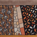artistic patterns on a gold and orange silk twilly