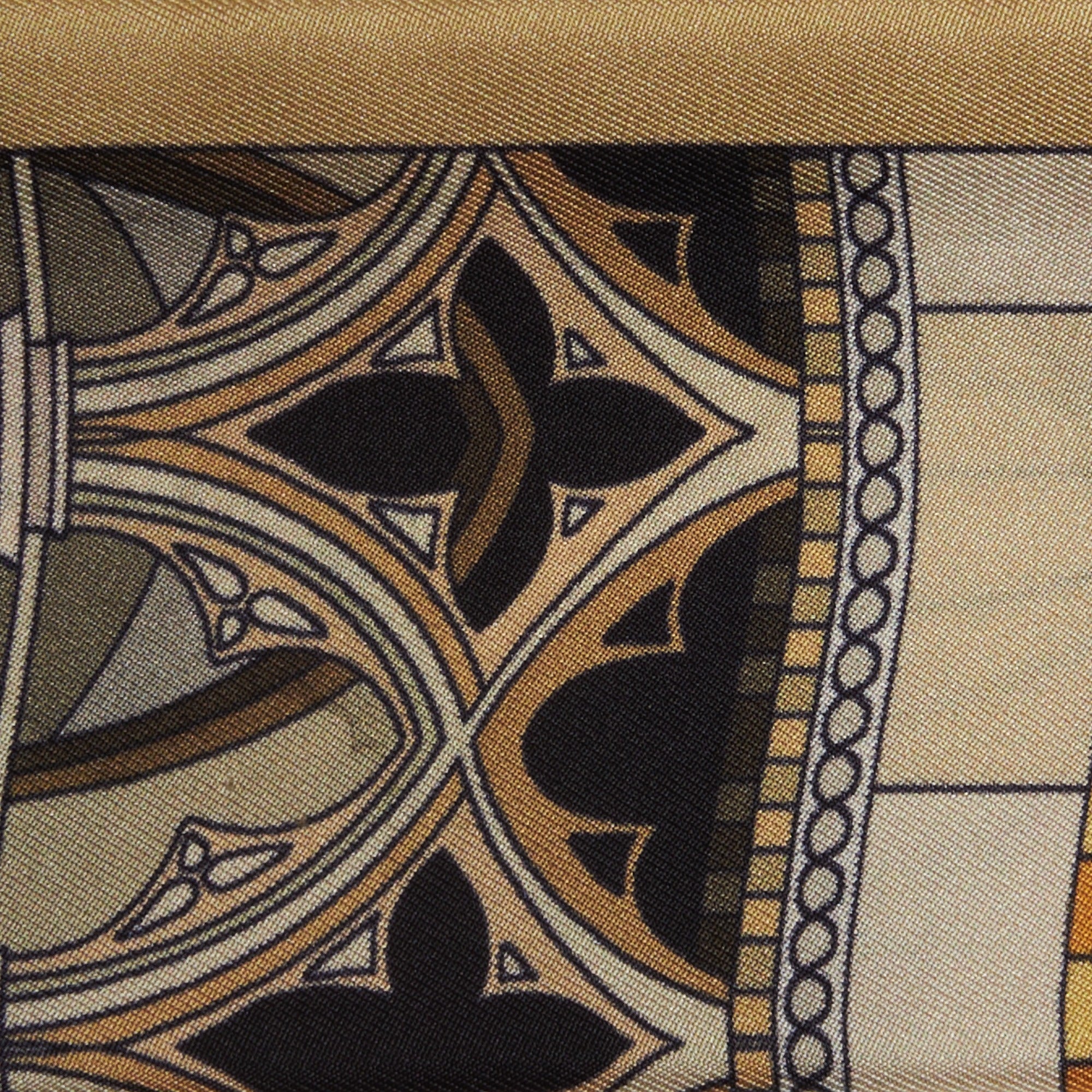 architectural decorations on a black and gold silk twilly