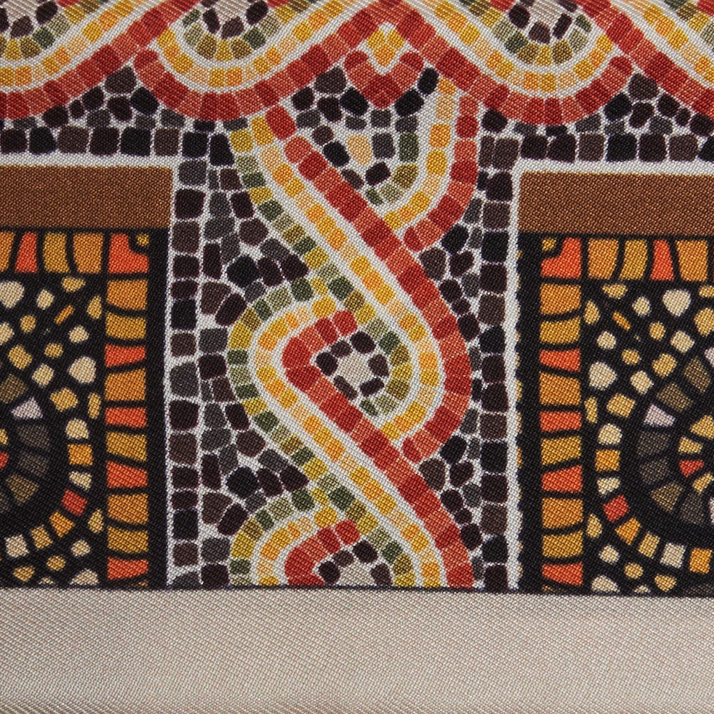 red, black and gold mosaic patterns on a silk twilly