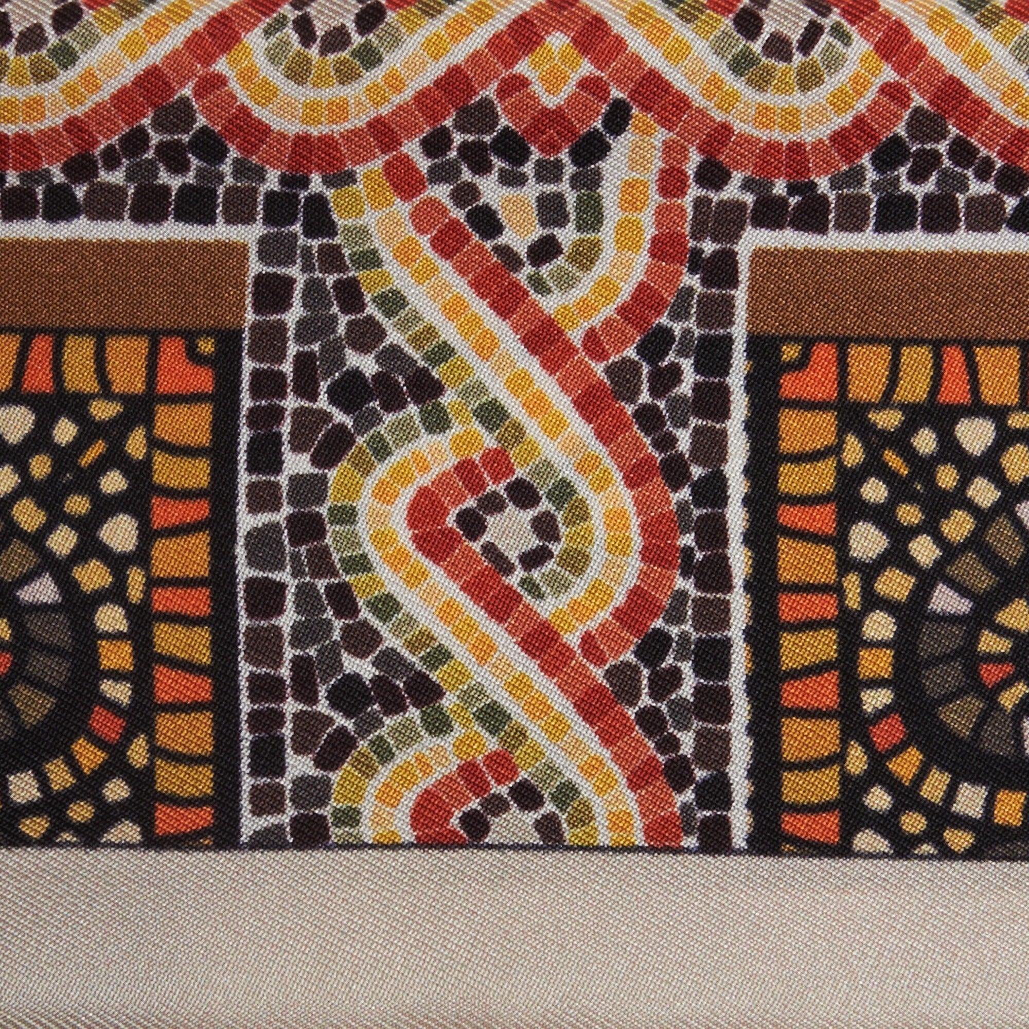red, black and gold mosaic patterns on a silk twilly