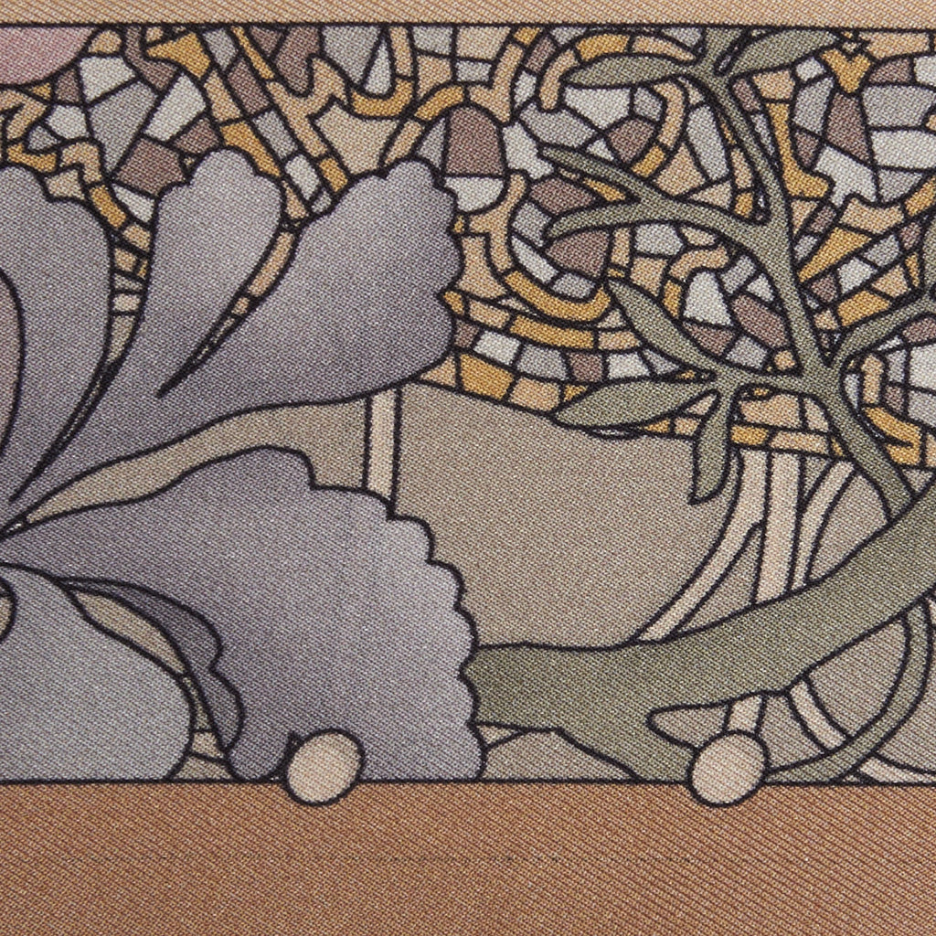 golden floral decorations on a silk twilly